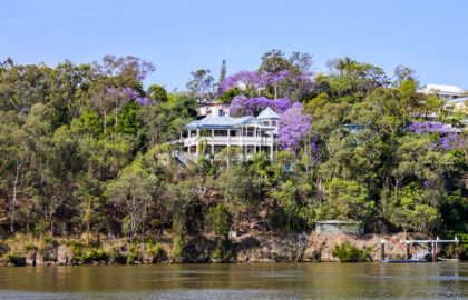 Traditional Queenslander House on the banks of river in Queensland Australia